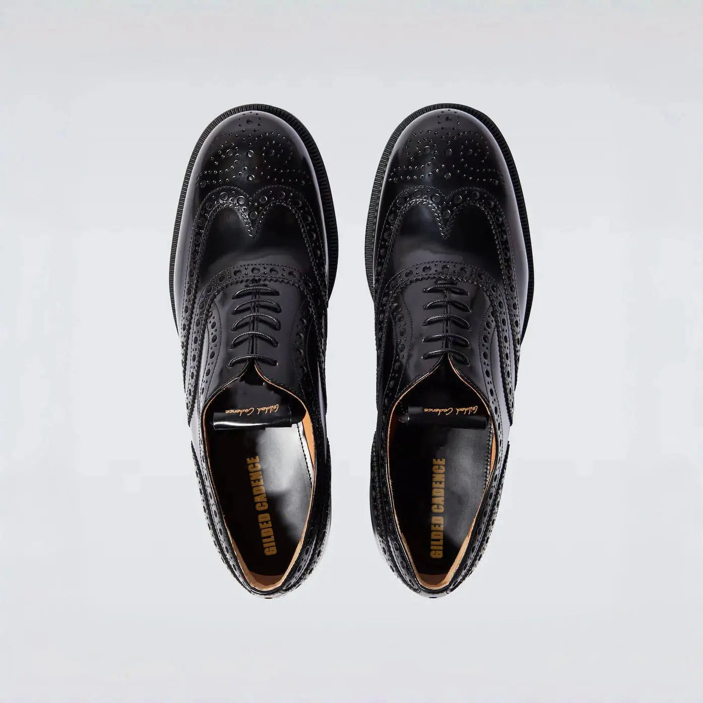 Polished Black Leather Wingtip Brogues Gilded Cadence