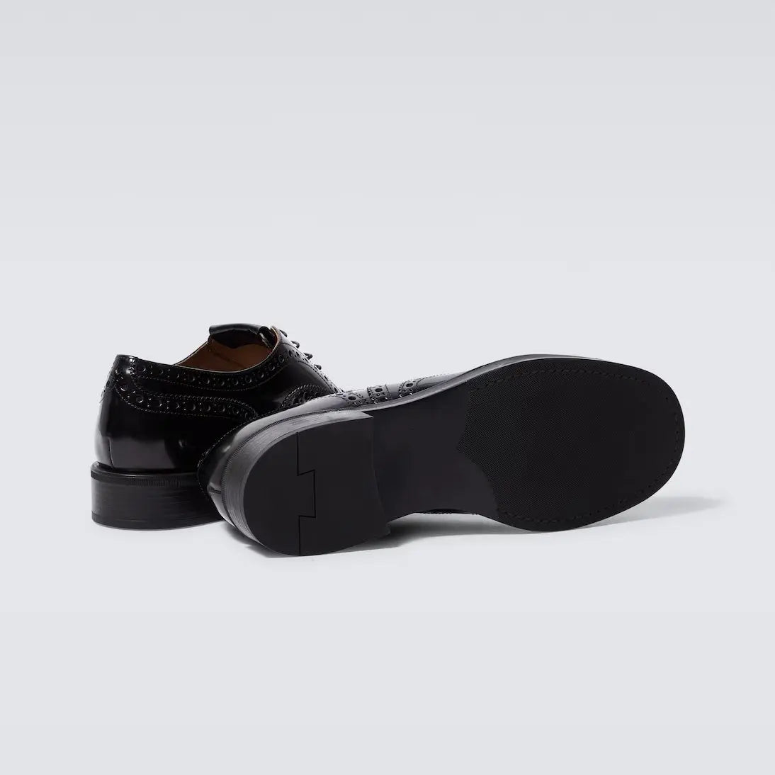 Polished Black Leather Wingtip Brogues Gilded Cadence